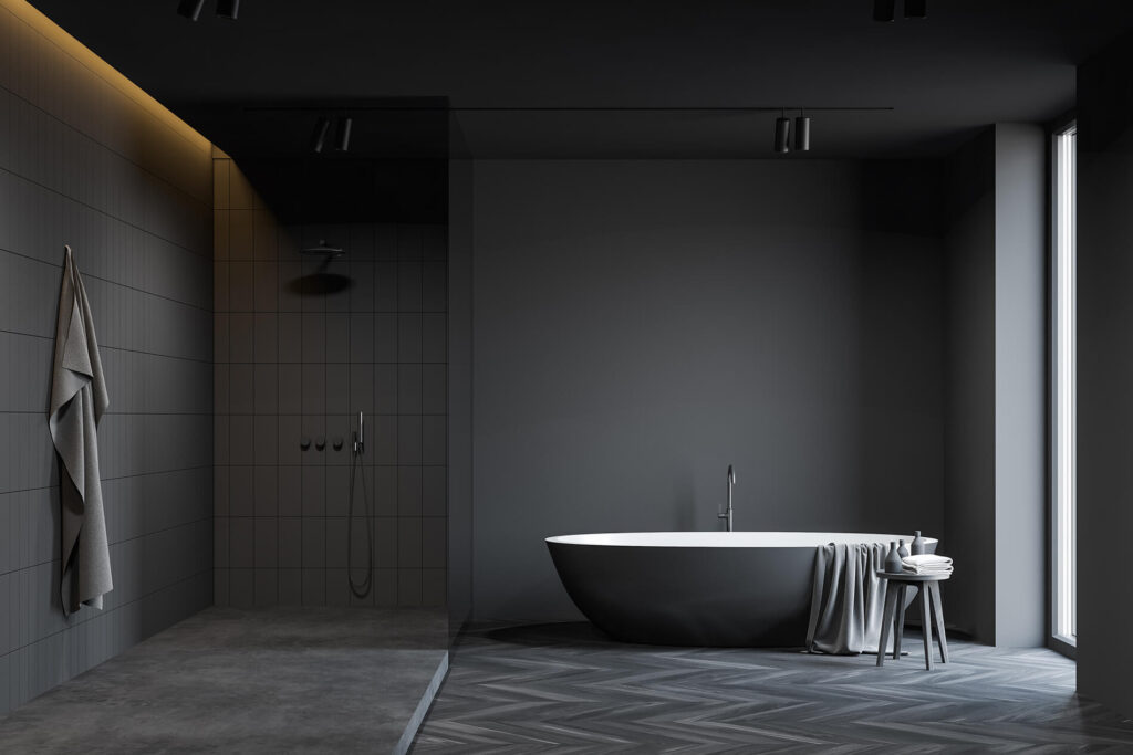 Dark-toned bathroom with a walk-in shower and freestanding bathtub